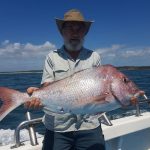 Man showing freshly caught Reef Fish in Summer 2017-2018